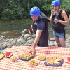 guests enjoying picnic after rafting tour with WAVE
