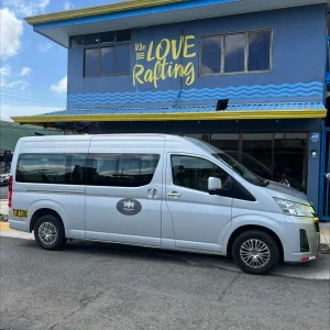 WAVE shuttle van parked in front of rafting center in Fortuna Downtown