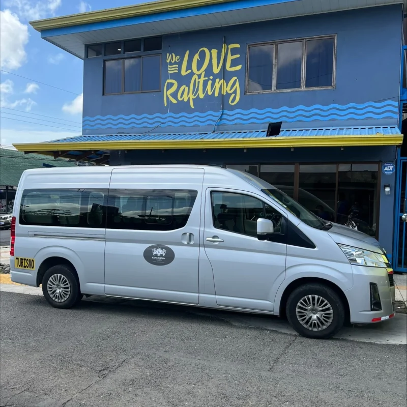 WAVE shuttle van parked in front of rafting center in Fortuna Downtown