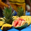 Freshly sliced tropical fruits including watermelon, pineapple, and papaya served during a rafting tour in Arenal, Costa Rica.